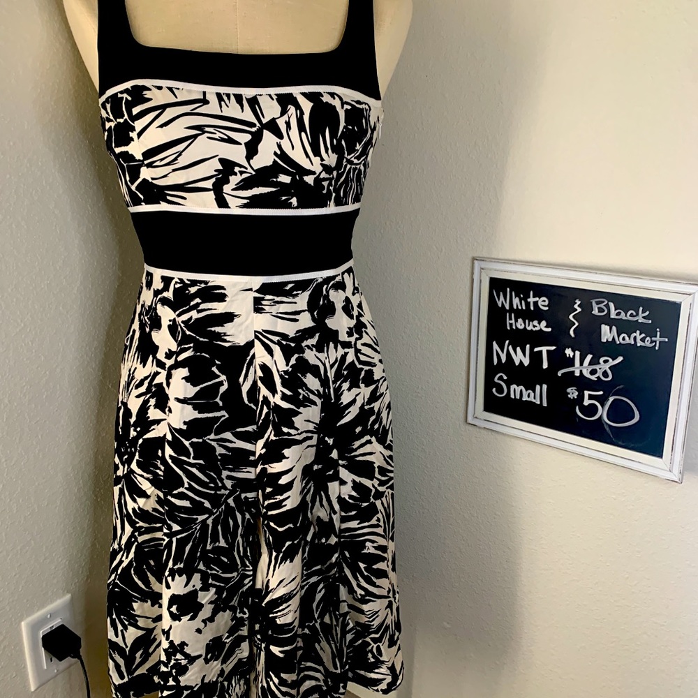 100% silk Beautiful black & white dress. Size 2